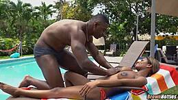 Black beauty enjoys poolside oral pleasure