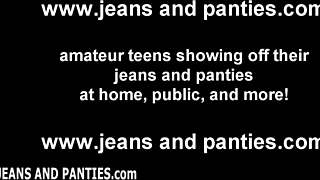 Seductive teen shows off her cute panties and jeans