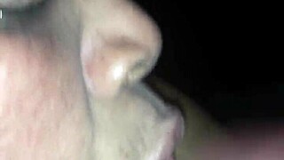 A mature black woman enjoys a facial in this video