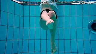 A young girl who is in the heat of the moment strips quickly and reveals her beautiful body